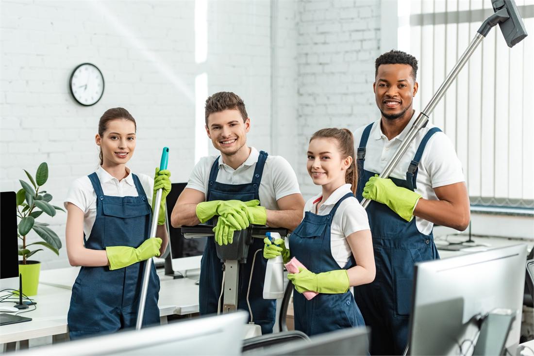 A commercial cleaning crew at work in an office